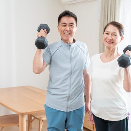 Asian,Senior,Couple,Doing,Strength,Training,With,Dumbbells